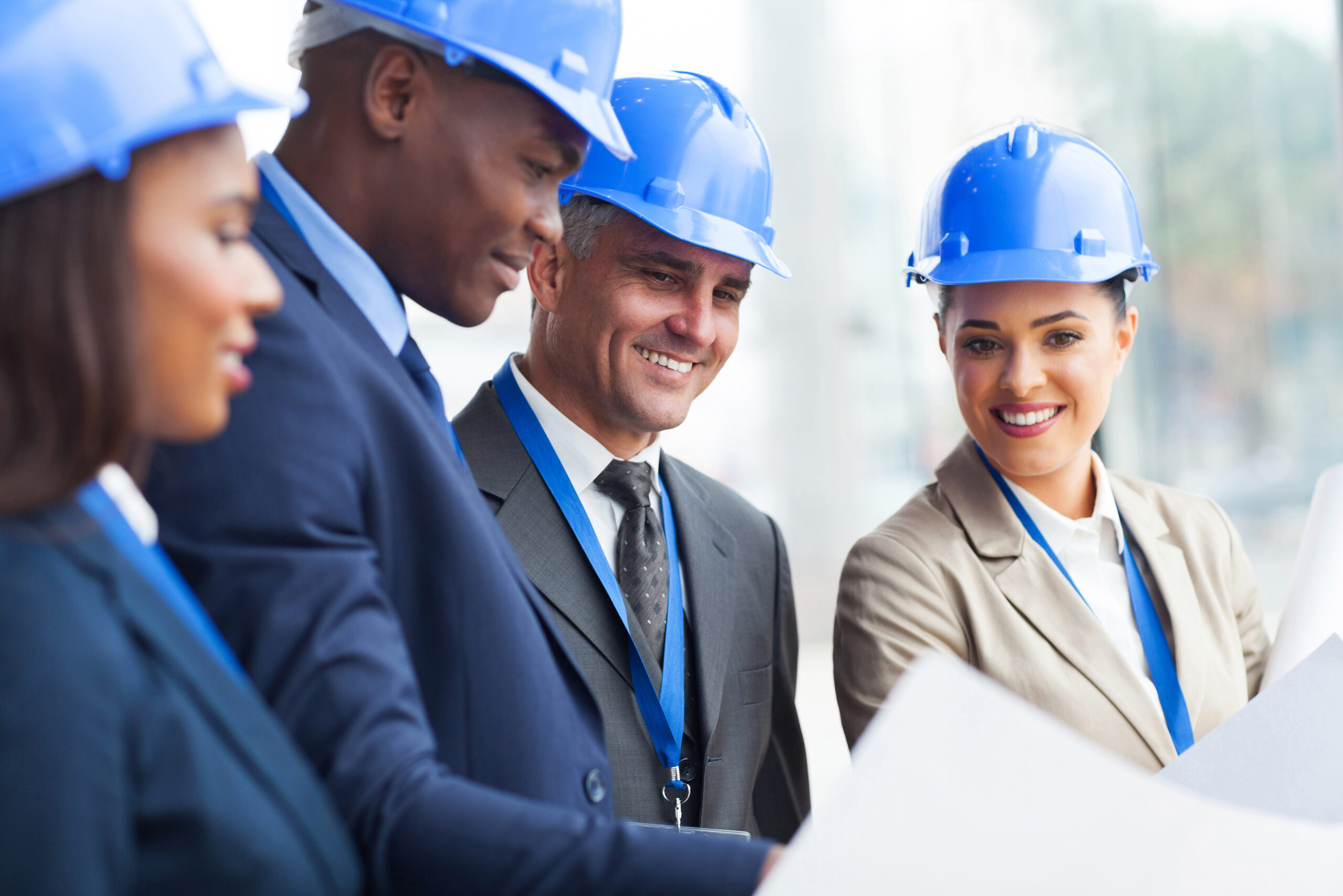 Senior Construction Manager Working With Team